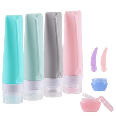 China Silicone 9 Pcs Travel Bottles For Toiletries-Leak Proof Travel Size Container-With EPI Bag And Jars And Spoon for sale