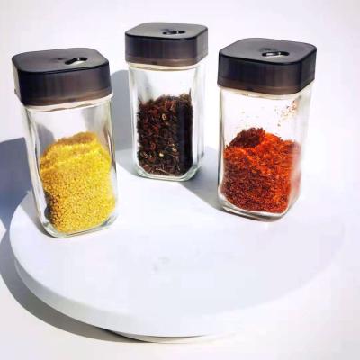 China New Style Three Holes Place Freshness Preservation Rotating Glass Chili Salt Glass Storage Jar Spice Jar Condiment Jar Storage Bottle for sale