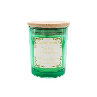 China Flame LA08T Colorful Transparent Multicolor Glass Scented Candle With Luxurious Custom Label And Bamboo Cover for sale