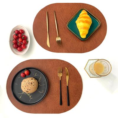 China Hotel Leather Waterproof Light Cushion Decorative Oval Luxury Western Table Mat Table Mat for sale