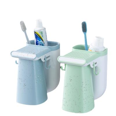 China Single Viable Style Toothbrush Holder Bathroom Household Couples Use Wall Mounted Toothbrush Storage Box for sale