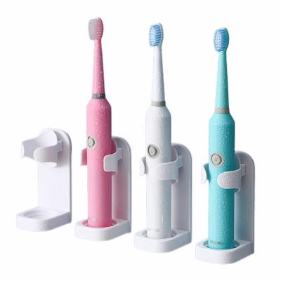 China Suction Wall Mounted Electric Toothbrush Holder Wall Mounted Bathroom Toothbrush Stand Wall Mounted Electric Toothbrush Holder for sale