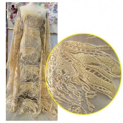 China Most Popular Design Viable Glitter Sequin And Beaded Bridal Material African Embroidered Stretch Lace Fabric for sale