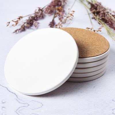 China Viable Wholesale Blank Sublimation White Round Coaster DIY Logo Printing Drinks Coffee Gift Coaster Custom for sale