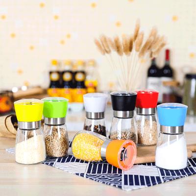 China Manual Grinder Salt And Pepper Bottle Set Ceramic Shakers Lead Free Glass Refillable Grinders for sale