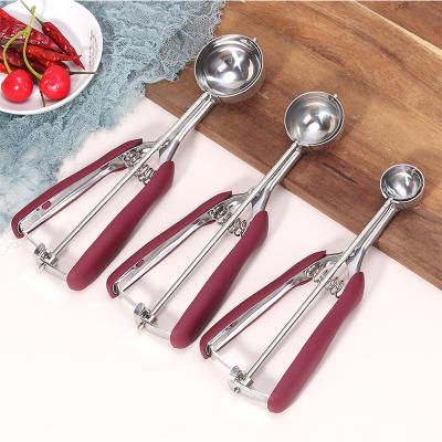 China Sustainable Chef Stainless Steel 3 Dish Spring Cookie Scoop With Soft Handle Ice Cream Spoon for sale