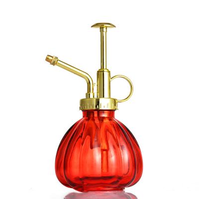 China Luxury Spritzer Mini Glass Watering Can Vintage Style Household Spray Bottle Factory Mister Top Pump One Hand Watering Jug for sale