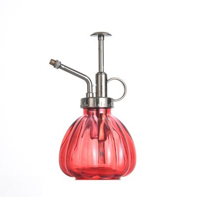 China Luxury Spritzer Mini Glass Watering Can Vintage Style Household Spray Bottle Factory Mister Top Pump One Hand Watering Jug for sale