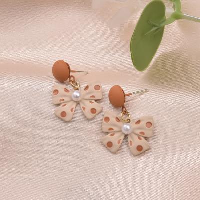 China New high quality winter custom cute orange bow earrings exquisite pearl charm earring for girls for sale