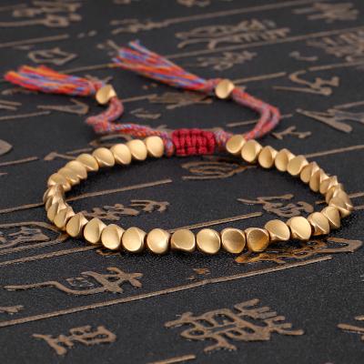 China Environmental Friendly Popular Handmade Tassels Bracelet Tibetan Buddhist Copper Rope Braided Adjustable Charm Bracelets for sale