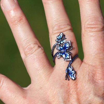 China Black Romance Ring Crystal Butterfly Finger Wrapped FASHIONABLE Ladies Rhinestone Oil Drip Rings for sale