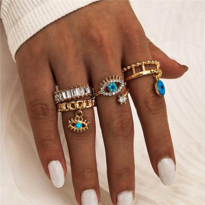 China Women Romantic Vintage 4Pcs Set Blue Eye Crystal Gold Plated Ring Zinc Alloy Knuckle Ring for sale