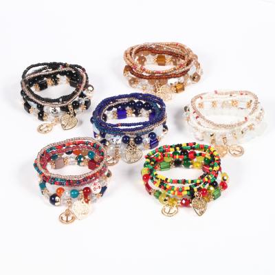 China Environmentally friendly popular multi-color rice glass beads stretch bracelet alloy tree of life charm bracelet set for sale