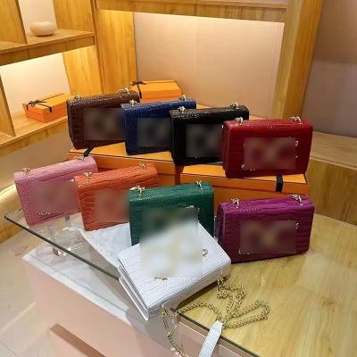 China 2022 Stylish Womens Messenger Bags with Button Closure and Beaded Decor in 7 Elegant Colors for sale