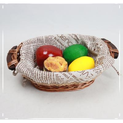 China Sustainable Wholesale Custom Oval Fruit Wicker Baskets With Handle for sale