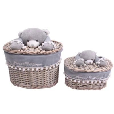 China Small Viable Oval Lidded Household Goods Wicker Storage Baskets With Animal Toy Handle Set Of 2 for sale