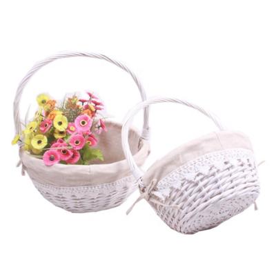 China Sustainable Round Handmade Wicker Basket Gift Willow Basket With Handles Set Of 2 for sale