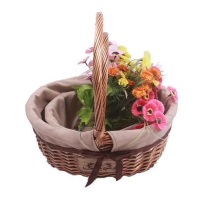 China Sustainable Oval Handmade Wicker Basket Gift Willow Basket With Handles Set Of 2 for sale