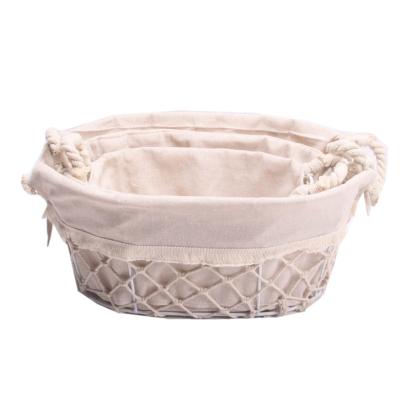 China Sustainable Cheap Power Coated Wholesale Oval Storage Wire Baskets With Fabric Liner Set Of 3 for sale