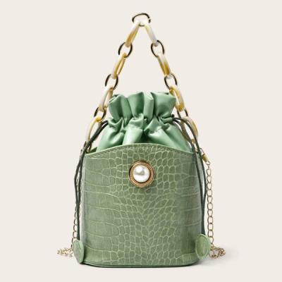 China 2020 fashion crocodile chain bucket bag for women minimalist pearl bucket bag with chain handle for sale