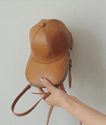 China Cross 2021 - Bag Brown Bum Bags Funny New Arrival Fashion Satchel Hat Shape Handbag PU Mini Tassel Decor Body Design Novelty for sale