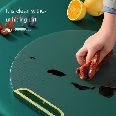 China Vegetable Green Plastic Cutting Board Bone Kitchen Sustainable Round PE Plastic Cutting Board for sale