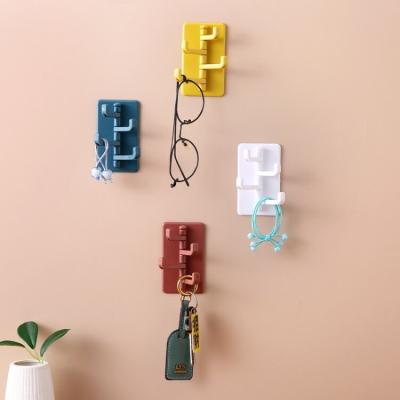 China Modern Factory Rotating Squishy Hook Knocks Kitchen Japanese Style Wall Hook Bathroom Color Glue Paste Punch Free Hanger for sale