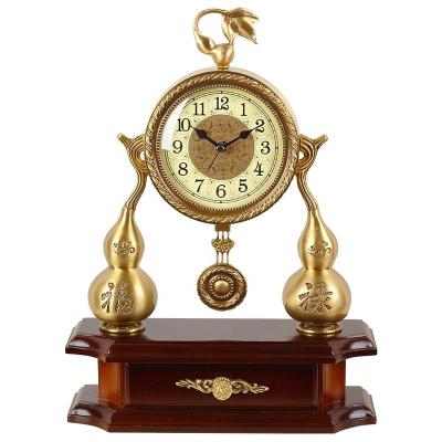 China European custom-made antique decorative brass creative quartz clock newcomer style antique clock for living room for sale