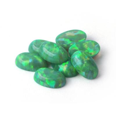 China Synthetic Play or Color Fire Opal Gemstones/Oval Cut Opal Cabochon/Loose Gemstone Opal Price for sale