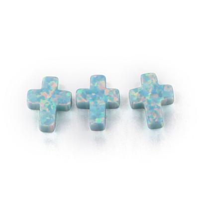 China Color Play Or Light Green Synthetic Fire Cross Loose Synthetic Fire Opal For Women Gifts for sale