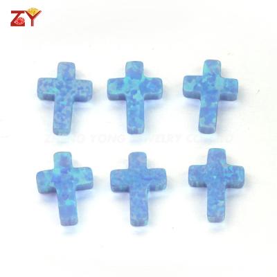 China Light blue color set or drilled hole 9x12mm Opal Stone cross fire OP06 for sale