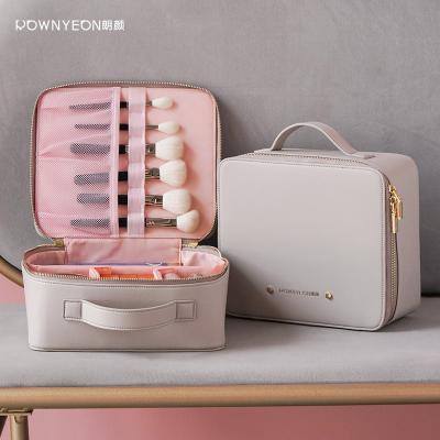 China Rownyeon Custom PU Zipper Makeup Train Case Professional Leather Cosmetic Organizer With Handle Large Capacity for sale