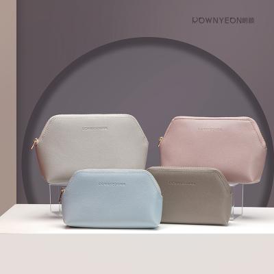 China Rownyeon Logo Trendy Cosmetic Brush Storage Small Pocket Makeup Zipper Waterproof Luxury Customized Hard Bag for sale