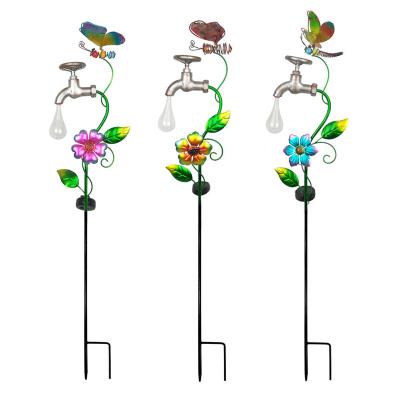 China Outdoor Yard Garden Ornament Pathway Metal Stake Lights with Butterfly Decor Solar Led Garden Light for sale