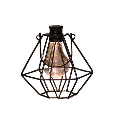 China Style Eclectic Simple Durable Looking Metal Lanter Hanging Decoraion Flame Lamp Solar Garden Lights for sale