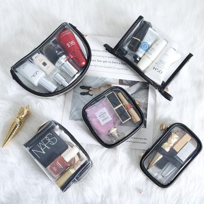 China Wholesale Small Makeup Bag Travel Bag Storage Fashion Toiletry Portable Transparent Capacity TPU Cosmetic Bags Large for sale