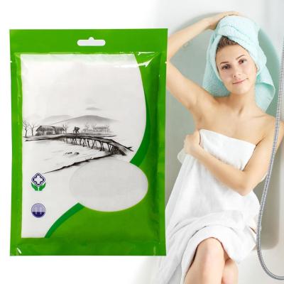 China Child Safe Portable Soft Shower Body Cleansing Hotel Eco-friendly White Soft Nonwoven Cotton Disposable Bath Towels Cheap Quick Dry for sale