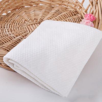 China Wholesale Customized Spundecd Eco-Friendly Thickened Nonwoven Fabric Safe For Kids Made 100% Pure Cotton White Disposable Bath Towels for sale