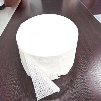 China Professional Wholesale 100% Nonwoven Waterproof Mesh Plain Cotton Spunlace Nonwoven Fabric For Baby Diaper for sale