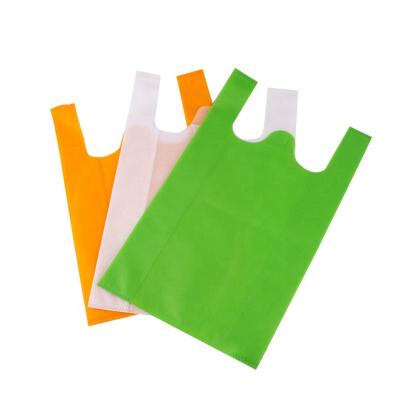 China Handled Bag Non Woven Fabric Biodegrade Custom Reusable Spunbound High Quality Nonwoven Vest Bag From Supplier Manufacturer for sale