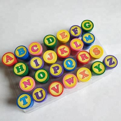 China Children's Toy 26 Alphabet Kids Or Teacher Stamp Funny Self Inking Toy Stamp for sale