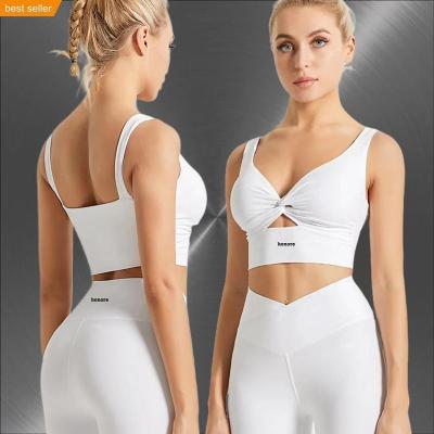 China New design full antibacterial yoga fitness sports bra workout nude pleated active bras for sale