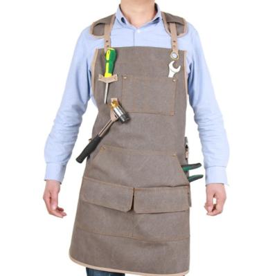 China Custom Logo Eco-frienly 16 oz Durable Waxed Hard Canvas Work Apron Tool Aprons with Metal Gripper Cross-Back Straps for sale