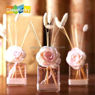 China Viable Transparent Glass Flower Scent Diffuser Bottle For Home Decor for sale