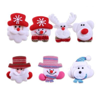 China Popular Gift LED Glowing Santa, Snowman, Deer, Bear Cartoon Plush Pin Badge Christmas Toys Christmas Pins for sale