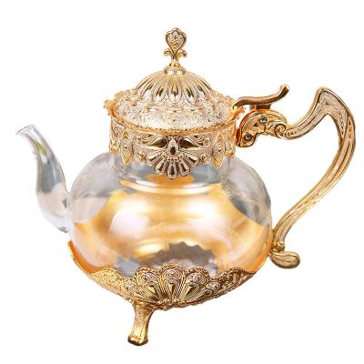 China Popular Small Teapot Teapot Manual Cordless Hip Flask Coffee Pot Cold Water Bottle Wine Kettle Arts and Crafts Glass Metal Pot for sale