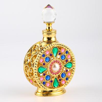 China Handmade High End Luxury Arabian Metal Perfume 10ml Aromatherapy Personality Diamonds Glass Perfume Bottles for sale