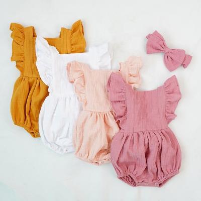 China Cute Birthday Babies' RTS 100% Cotton Muslin Rompers Ruffle Back Cross Shoulder Button Clothes for sale