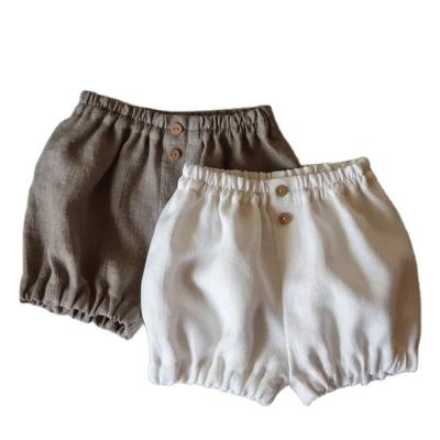 China Viable Cute Baby Solid Buttons Lounging Boys Infant Girls Bubble Canvas Shorts for sale