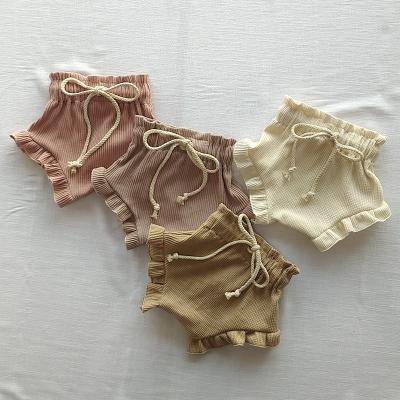 China RTS Newborn Elastic and Baby Waffle Cotton and Cotton Bloomers Drawstring Ribbed Shorts for sale